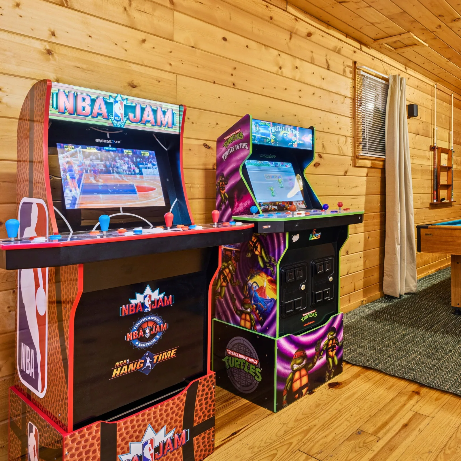 Arcade games in the family game room at Three Bears Cabin